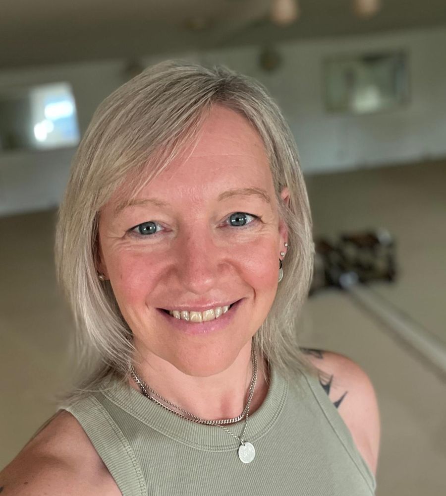 Helen smiling in the studio