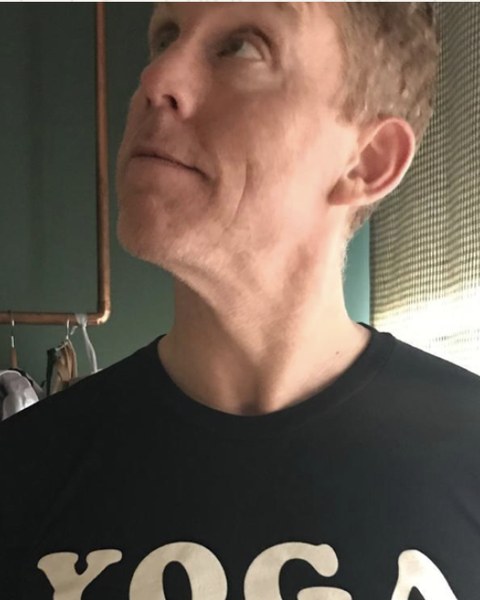 Craig in a yoga t-shirt